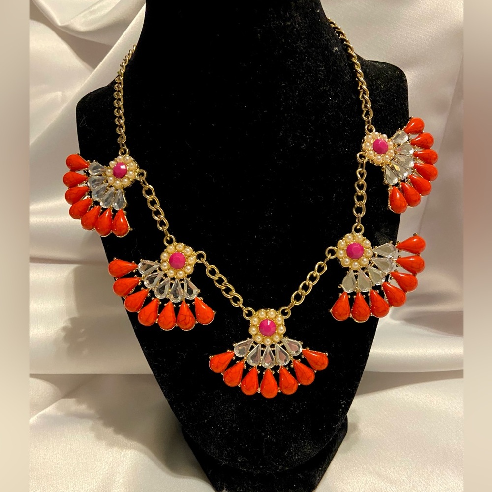 Goldtone statement necklace with clear rhinestones, coral and fuchsia stones